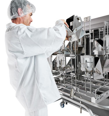 Industrial cleaning system for multi-head weigher components